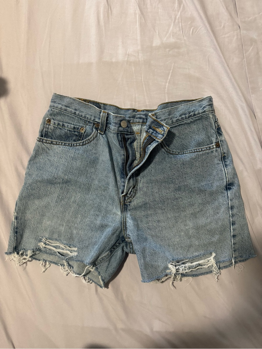 Levi’s Light Blue Distressed Denim Shorts